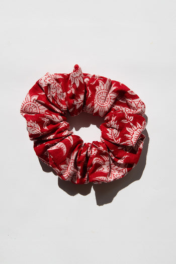 Daughters of India Upcycled Scrunchie in Saffron, a vibrant red-orange hair scrunchie made from upcycled cotton fabric