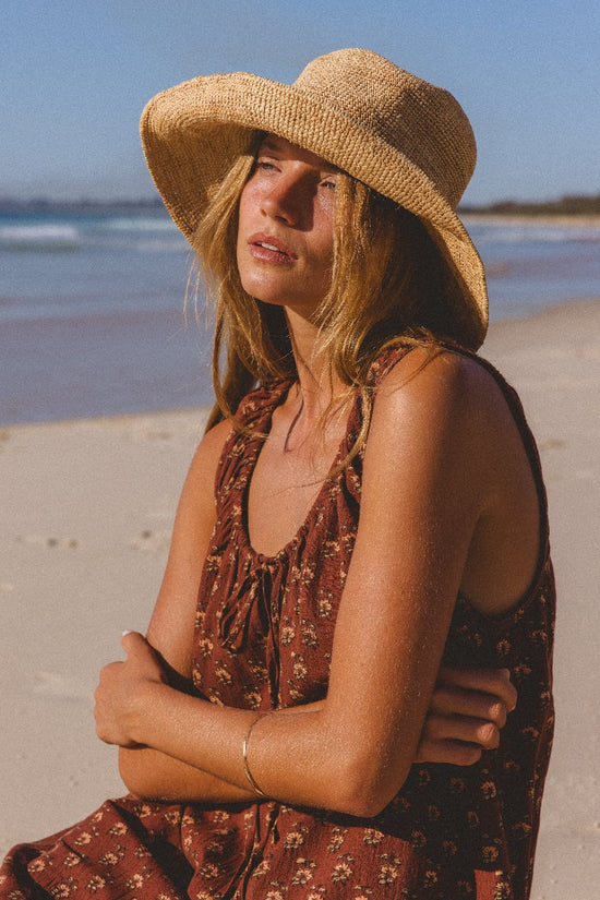 Sundress Mini Almond — studio side profile, three-quarter view, short mini hemline showing legs, sleeveless silhouette, almond cotton block print sundress, artisan India | Daughters of India